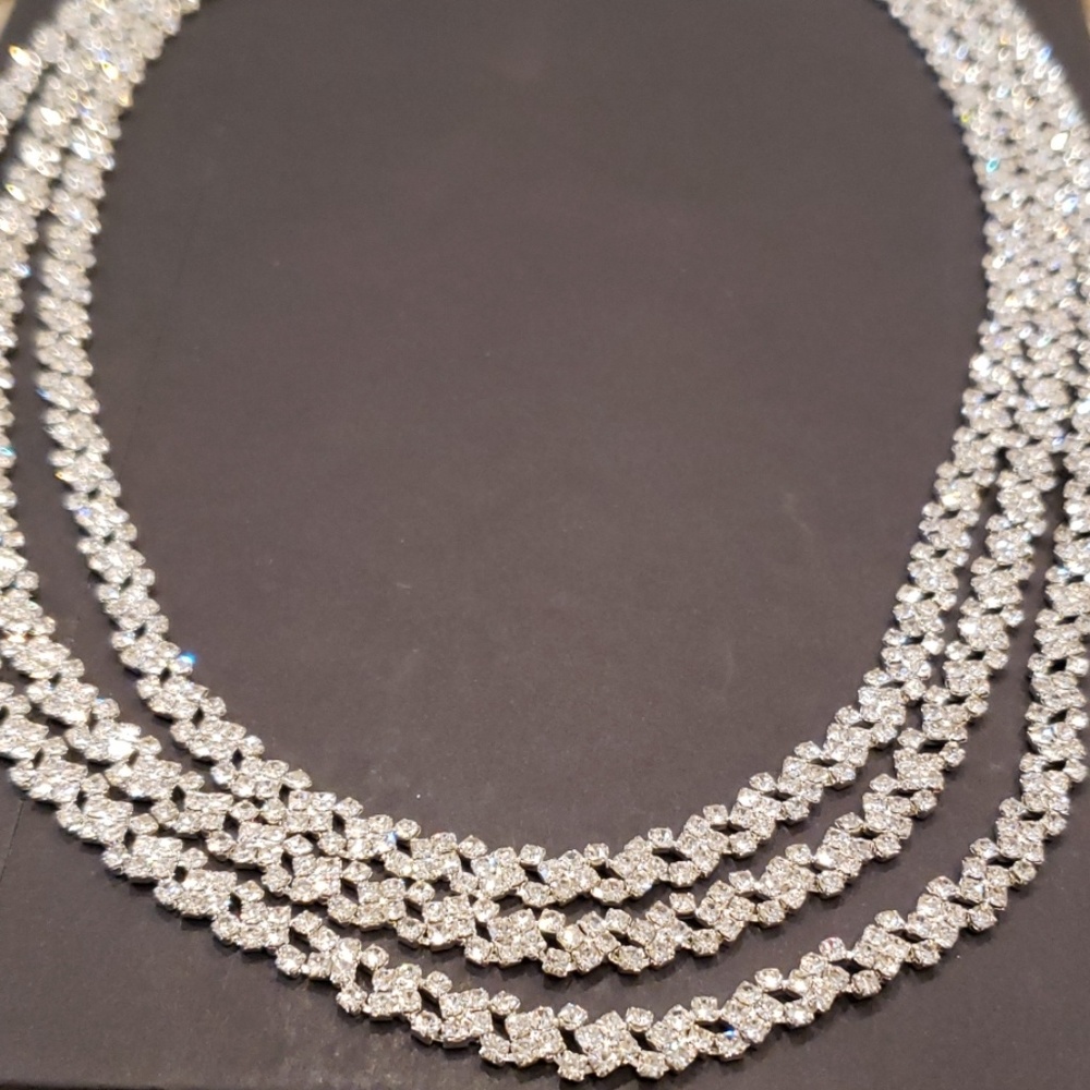 Very sparkly new three stand necklace